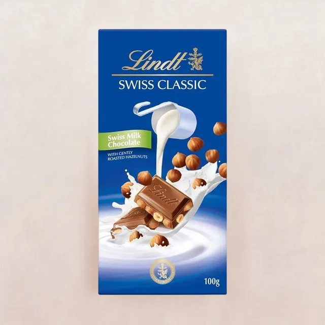 b8ab966d-e51a-49a0-b8c3-9c8b286a8ac3.jpeg Lindt Swiss Milk Hazelnut Chocolate 100G - Image 1